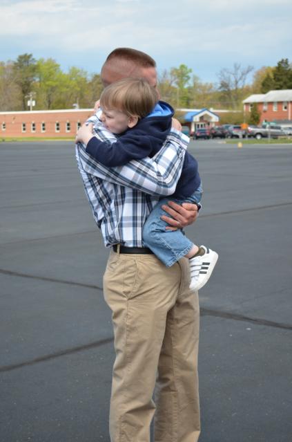 usmc-ocs-family-day-child A candidate from OCC-209 greeting his son on Family Day